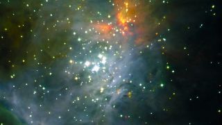 This image shows a color composite of near-infrared images of the central regions of the Orion Nebula, including the Trapezium Cluster.