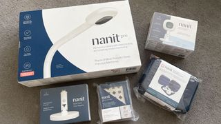 Nanit Pro products led out on a carpet