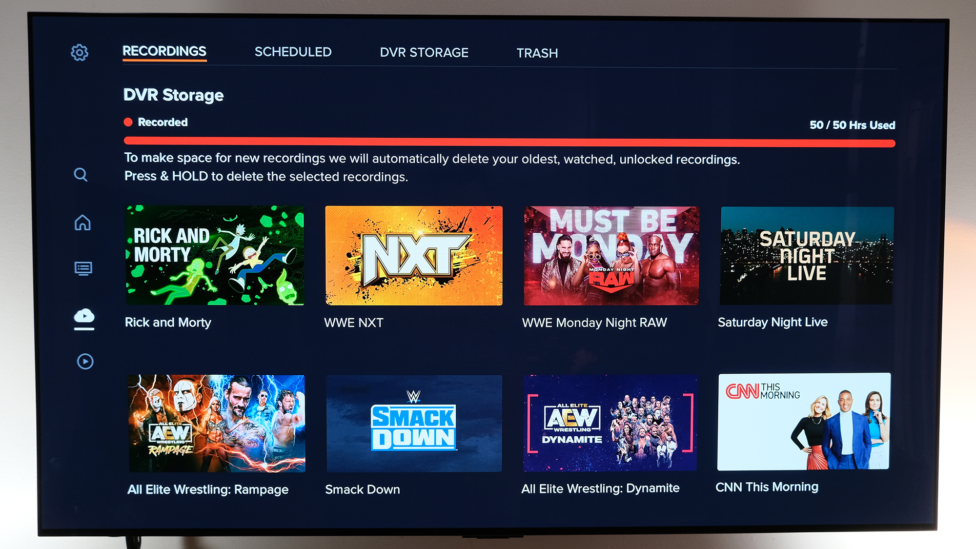 Sling TV's DVR page on a wall-mounted TV