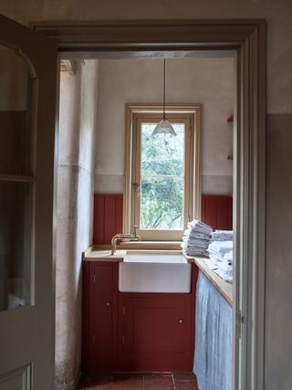 narrow utility room ideas with a vintage sink in a farmhouse corner