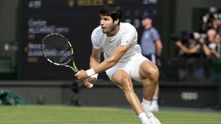 LONDON, ENGLAND - JULY 16. Carlos Alcaraz of Spain in action against Novak Djokovic of Serbia in the Gentlemen's Singles Final match on Centre Court during the Wimbledon Lawn Tennis Championships at the All England Lawn Tennis and Croquet Club at Wimbledon on July 16, 2023, in London, England. (Photo by Tim Clayton/Corbis via Getty Images)