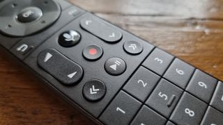 The pause button on a TV remote