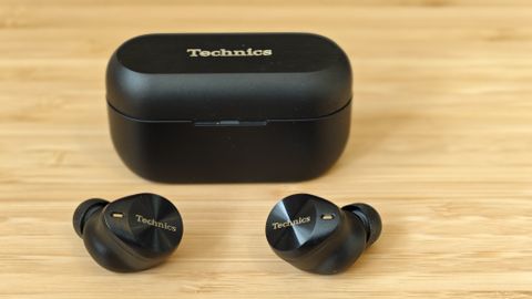 Panasonic Technics EAH-AZ80 earbuds sitting on a desk