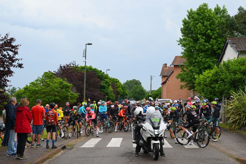 BOISSETSAINTPRIEST FRANCE JUNE 06 A general view of the peloton neutralization of the race due to a multiple fall during the 76th Criterium du Dauphine 2024 Stage 5 a 167km stage from Amplepuis to SaintPriest UCIWT on June 06 2024 in BoissetSaintPriest France Photo by Dario BelingheriGetty Images