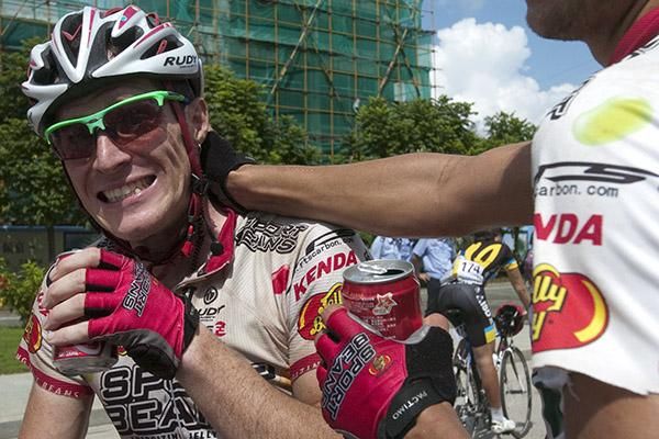 Your the man: Stage winner Brad Huff is congratulated by a Jelly Belly teammate in Xinglong.