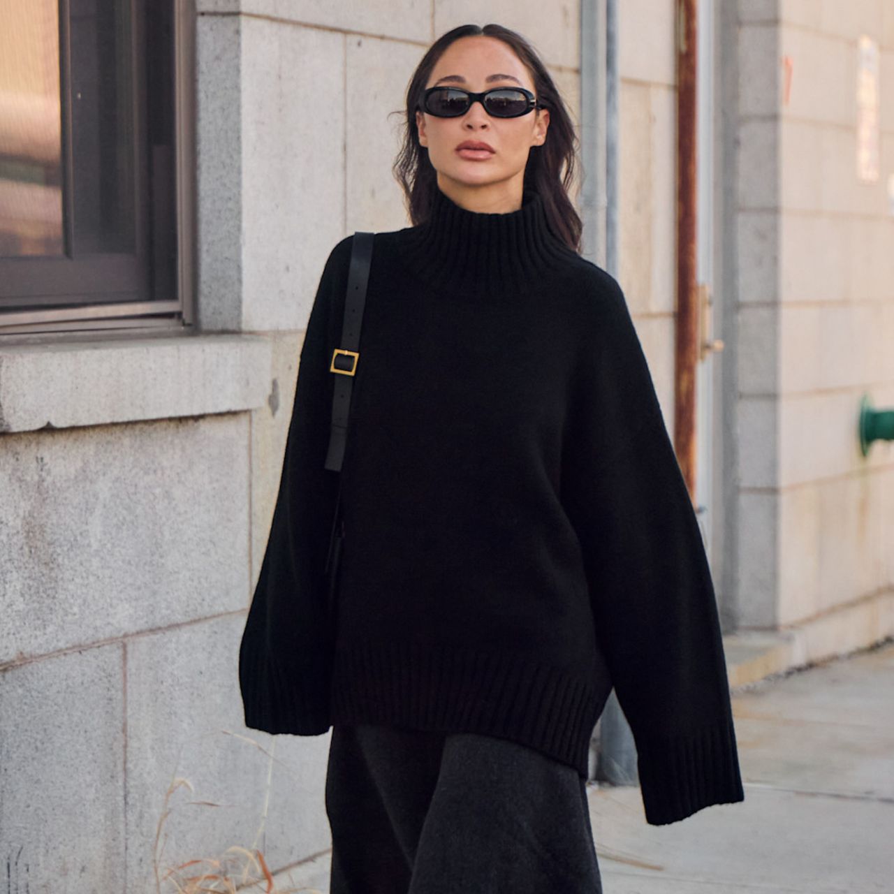 A three image collage of women wearing knit sweater outfit of a black sweater with a skirt and black bag