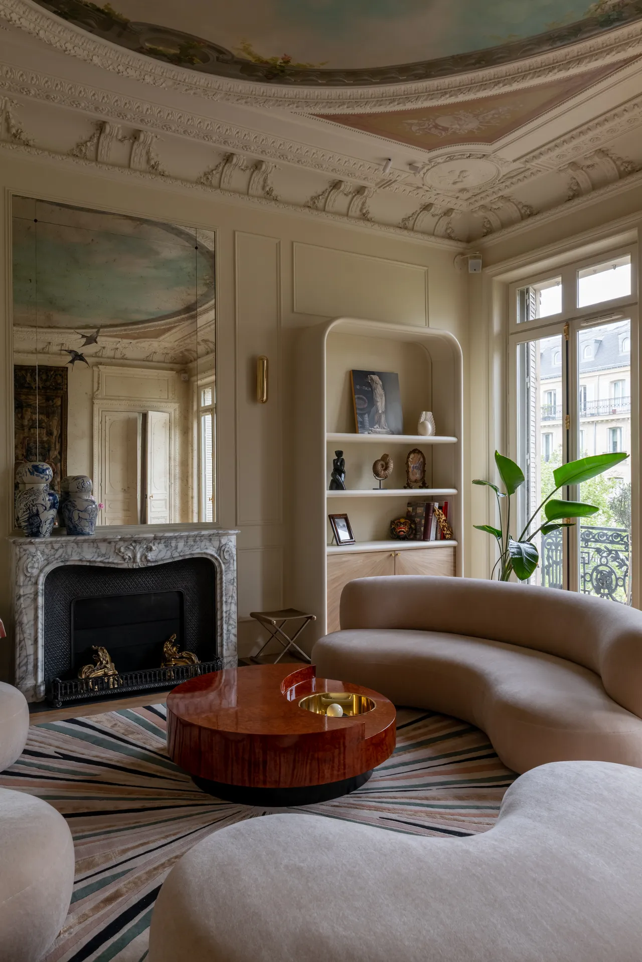 Living room with curved sofas