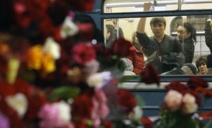 A memorial set out for the 39 Russian subway riders lost in the blast.