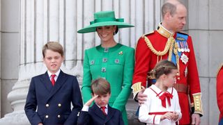 Prince George of Wales, Prince Louis of Wales, Catherine, Princess of Wales, Princess Charlotte of Wales, Prince William, Prince of Wales, King Charles III and Queen Camilla stand on the balcony of Buckingham Palace to watch a fly-past of aircraft by the Royal Air Force during Trooping the Colour on June 17, 2023 in London, England. Trooping the Colour is a traditional parade held to mark the British Sovereign's official birthday. It will be the first Trooping the Colour held for King Charles III since he ascended to the throne.