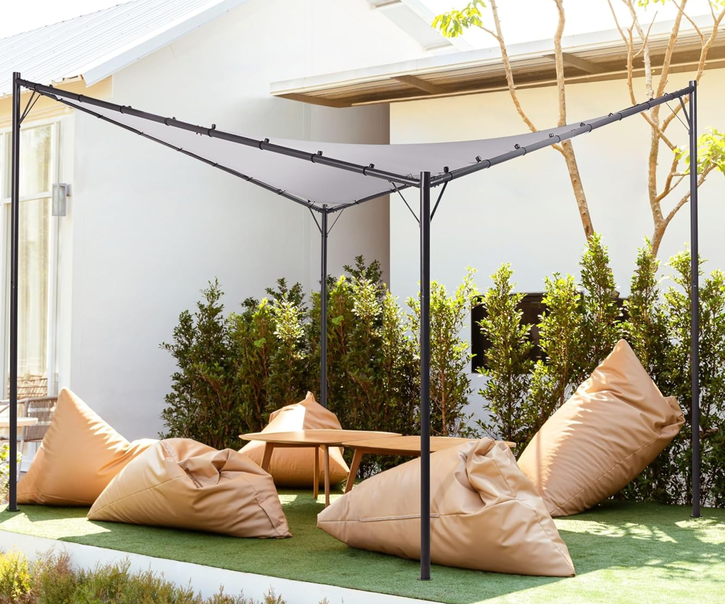 Shade sail with legs and beanbags underneath it