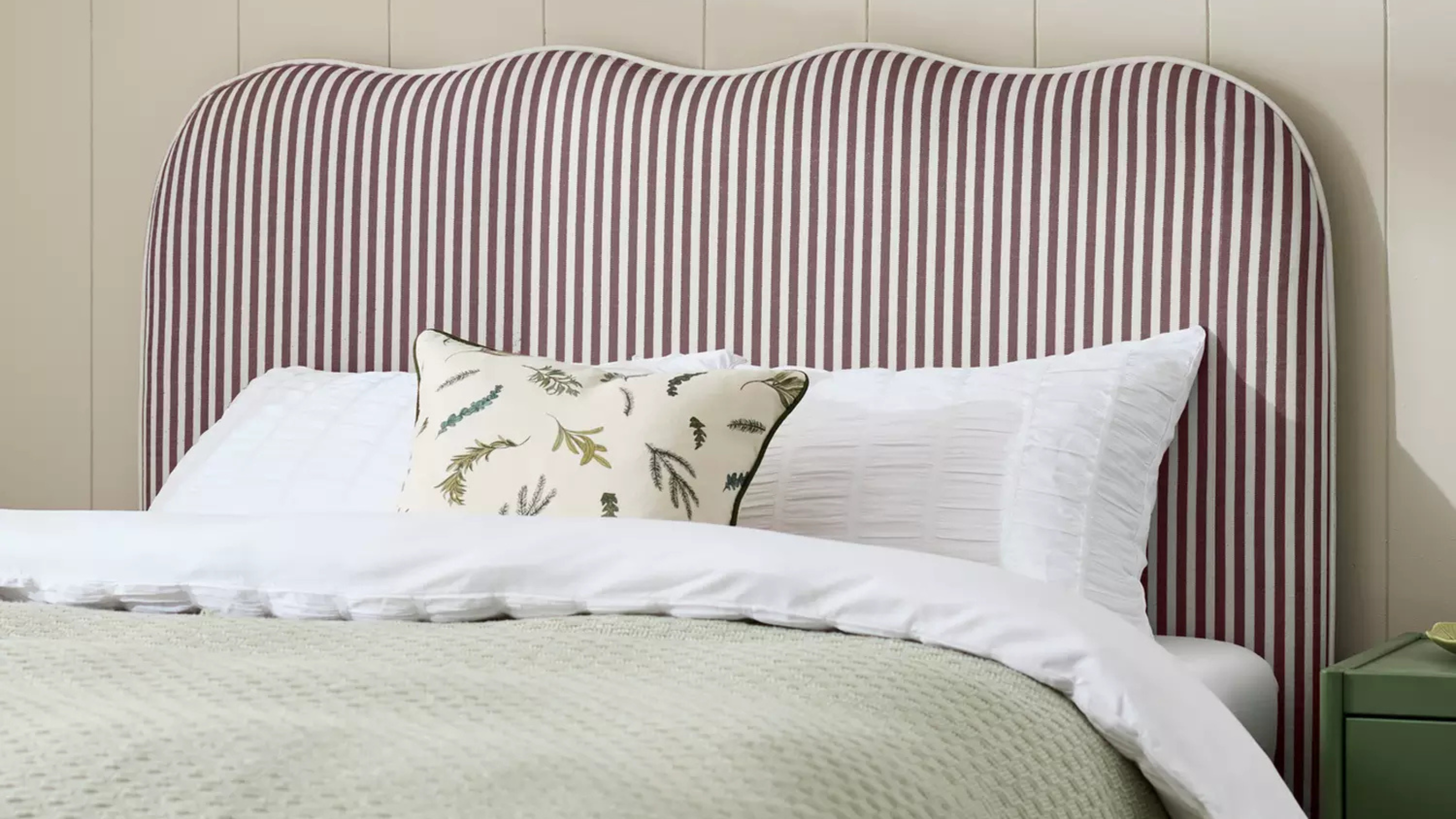 Habitat Onda headboard in plum.