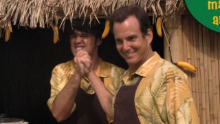 Justin Grant Wade as Steve Holt high-fives Will Arnett's Gob Bluth on Arrested Development.