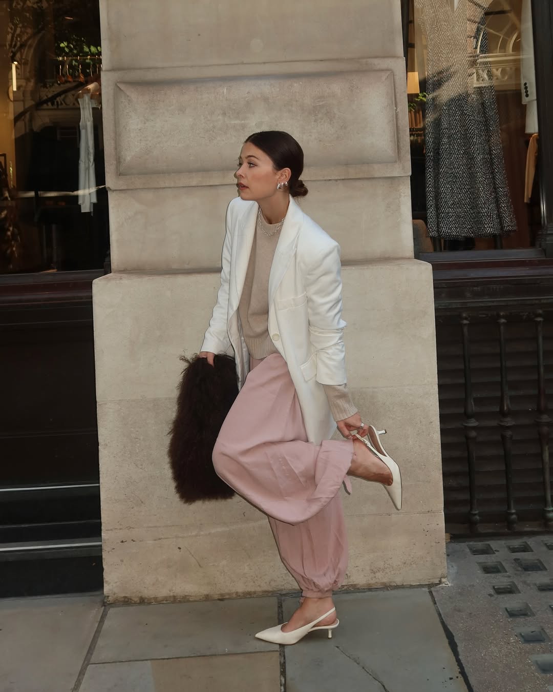 2026 colour combinations: Influencer Alice Satterthwaite wearing camel jumper and pink trousers.