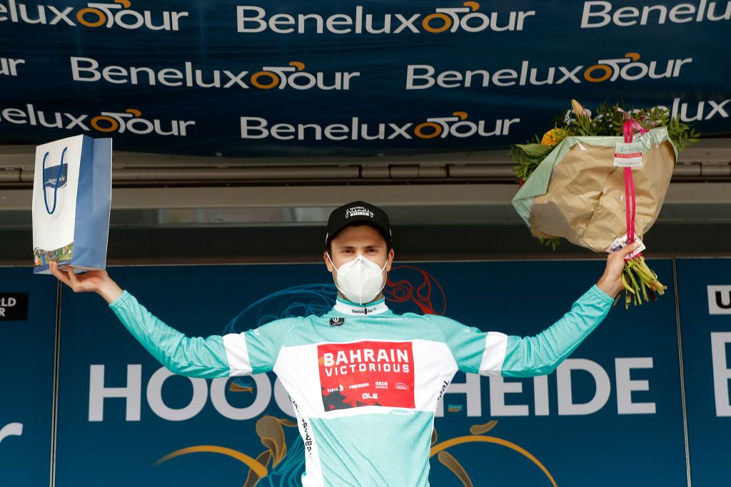 HOOGERHEIDE NETHERLANDS SEPTEMBER 01 Phil Bauhaus Germany and Team Bahrain Victorious celebrates winning the Turquoise Points Jersey on the podium ceremony after the 17th Benelux Tour 2021 Stage 3 a 1683km stage from Essen to Hoogerheide BeneluxTour on September 01 2021 in Hoogerheide Netherlands Photo by Bas CzerwinskiGetty Images