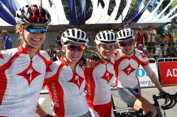 The Specialized women line up together after their victory