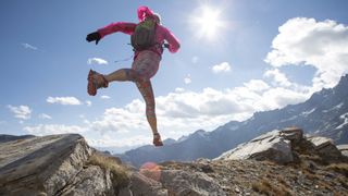 Trail runner wearing hydration pack