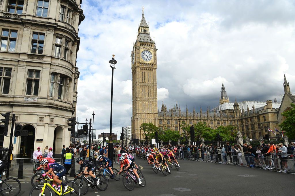 LONDON ENGLAND MAY 29 LR Eleonora Camilla Gasparrini of Italy and Team Valcar Travel Service Leah Kirchmann of Canada and Team DSM Christine Majerus of Luxembourg and Team SD Worx and a general view of the peloton competing in front of The Big Ben during the 5th RideLondon Classique 2022 Stage 3 a 835km stage from London to London RideLondon UCIWWT on May 29 2022 in London England Photo by Justin SetterfieldGetty Images