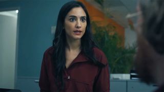 Sasha Bordeaux looking at an off-camera John Economos in Peacemaker season 2 episode 5