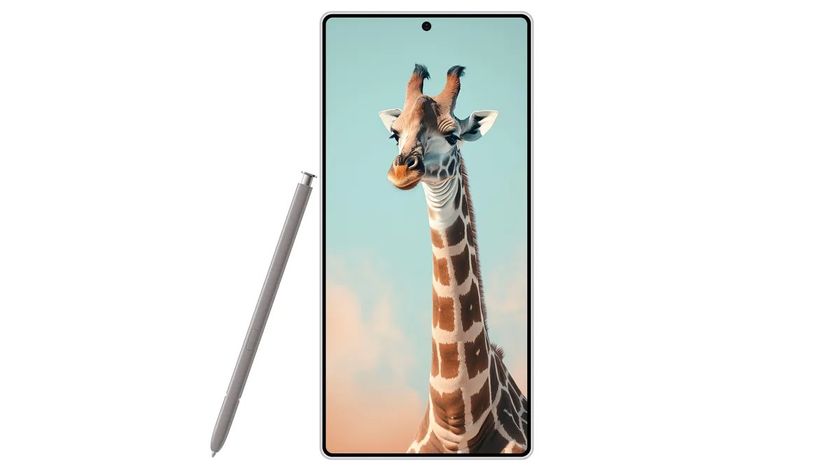 A leaked photo of the Samsung Galaxy S25 Ultra front-on, with its S Pen stylus propped up against its side. On screen is a portrait photo of a giraffe.