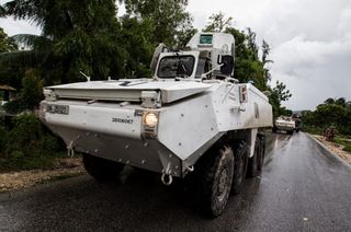United Nations Stabilization Mission in Haiti (UN MINUSTAH) military conduct a reconnaissance patrol near the Haitian town of Leoganne on Oct. 5, 2016, a day after Hurricane Matthew passed over the nation.