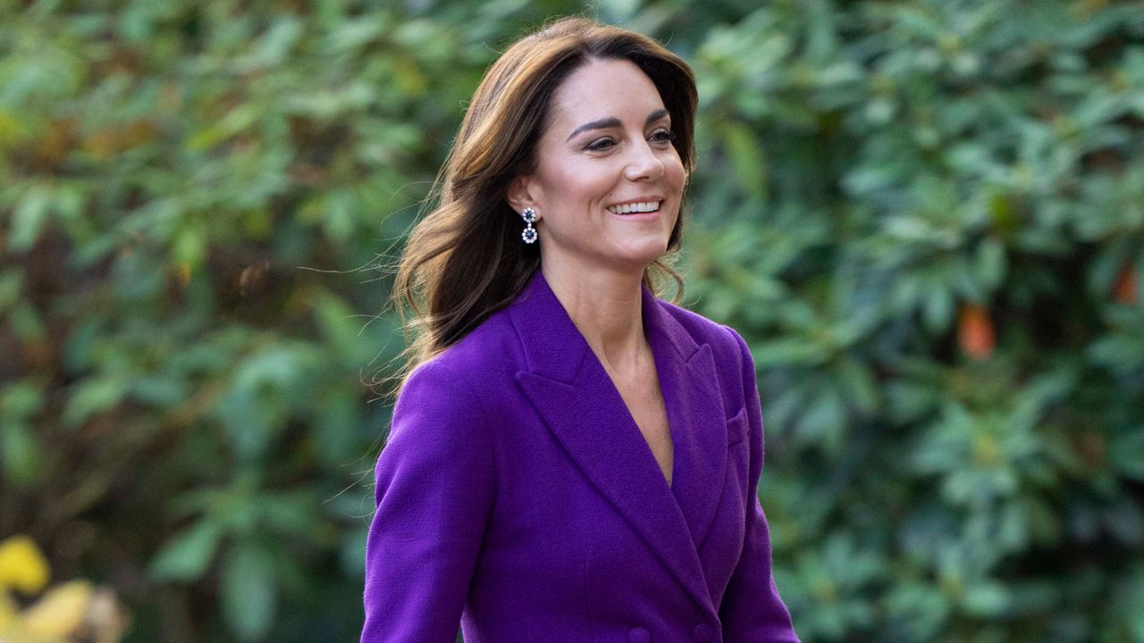 Kate Middleton in a purple suit