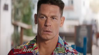 John Cena looking surprised while wearing a Hawaiian shirt in Argylle.