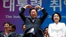 South Korean President Lee Jae-myung makes a heart gesture after inauguration