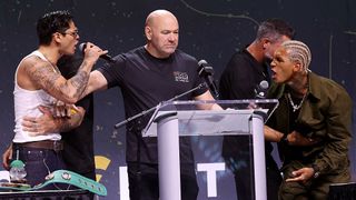 Ryan Garcia and Conor Benn, separated by promoter Dana white, confront each other before their WBC welterweight world title fight in Las Vegas.