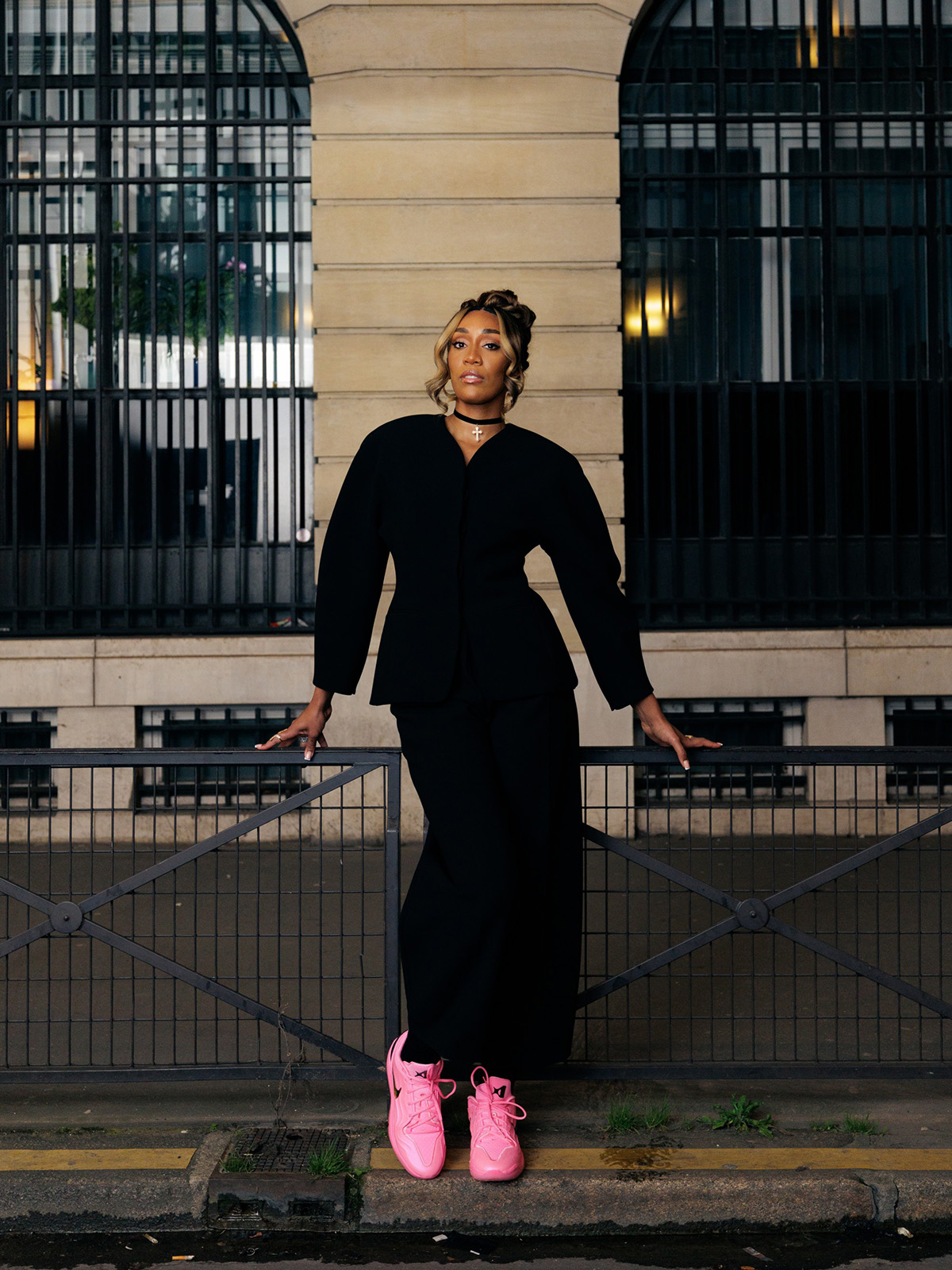 A'ja Wilson attending Le Grand D&amp;icirc;ner du Louvre wearing a black Jacquemus dress and her Nike A'Two A'Pink Shoe sneakers in Paris during her Nike global tour.