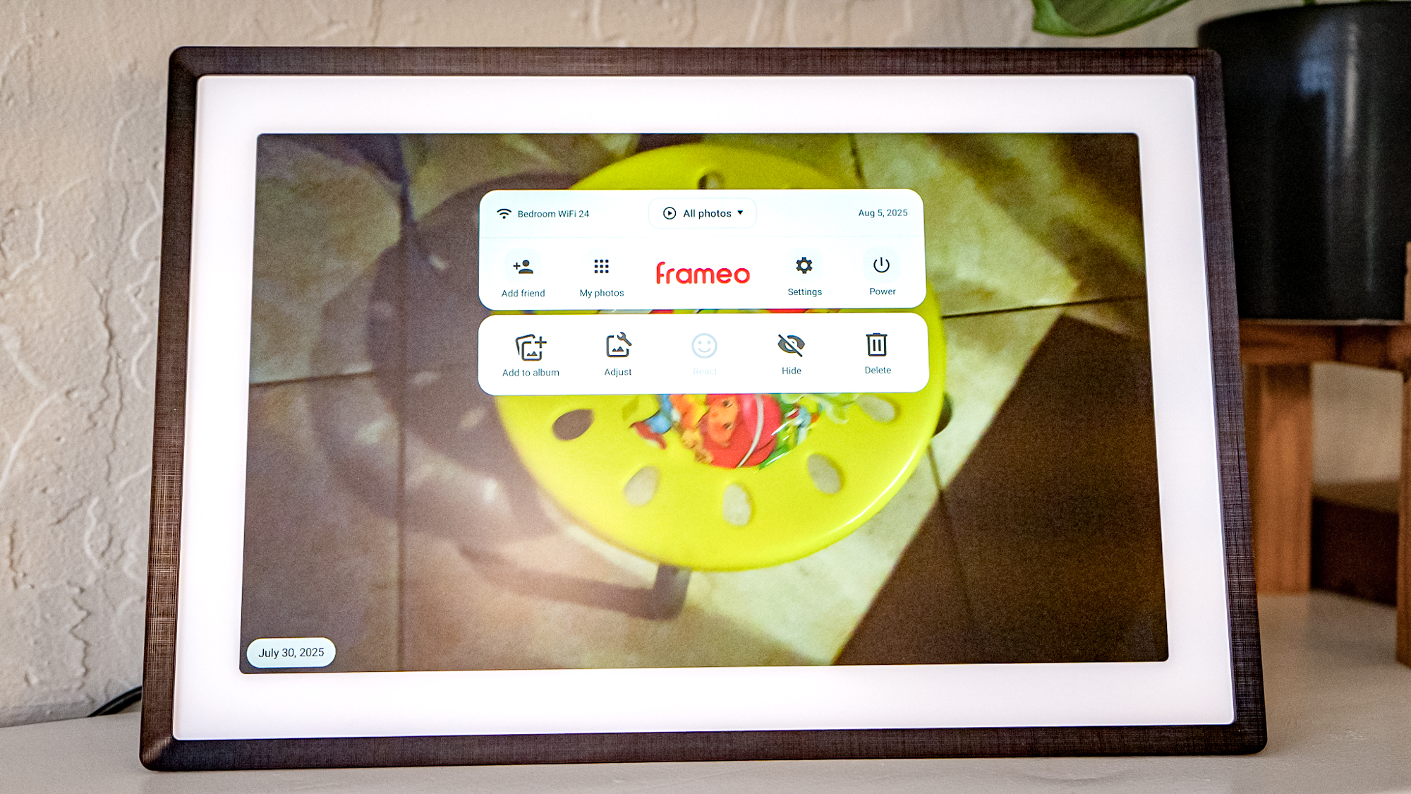 Lexar Pexar 11-inch photo frame on a shelf