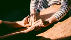 couple holding hands 