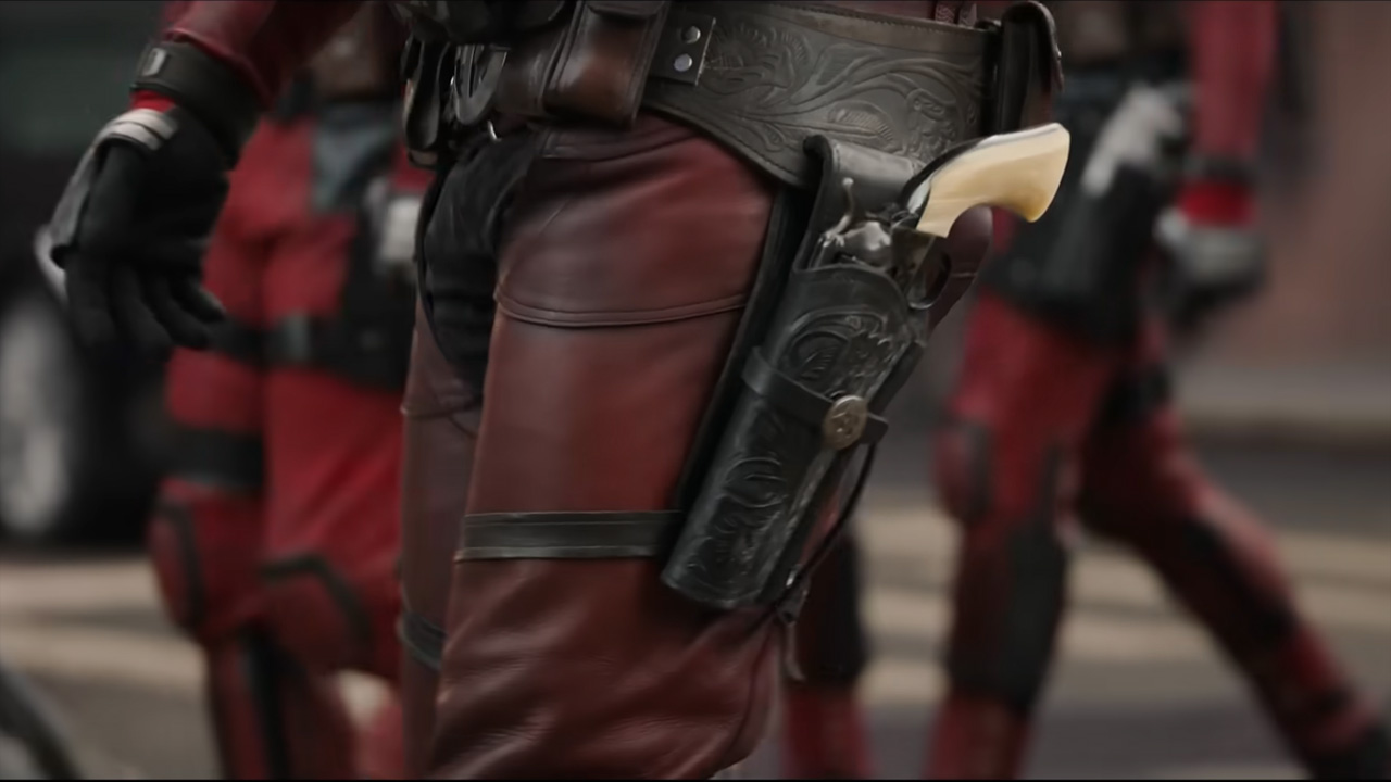 A screenshot of Cowboy Deadpool's left leg and holstered pistol in Deadpool and Wolverine