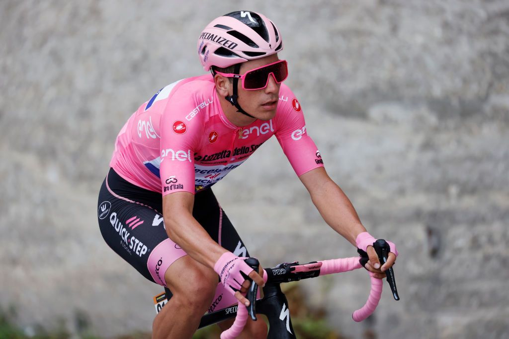 Team Deceuninck rider Portugals Joao Almeida wearing the leaders pink jersey rides during the 10th stage of the Giro dItalia 2020 cycling race a 177kilometer route between Lanciano and Tortoreto on October 13 2020 Photo by Luca Bettini AFP Photo by LUCA BETTINIAFP via Getty Images