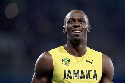 Usain Bolt of Jamaica celebrates winning the Men's 200m Final on Day 13 of the Rio 2016 Olympic Games at the Olympic Stadium on August 18, 2016 in Rio de Janeiro, Brazil.