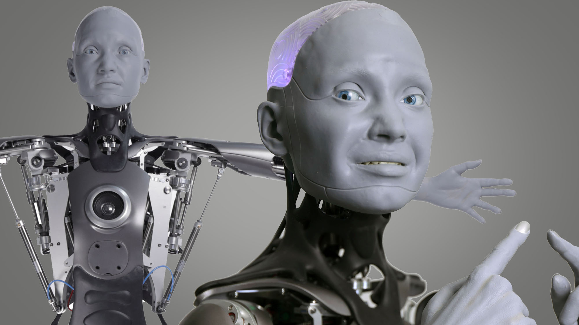 Robot humanoid Ameca dengan latar belakang abu-abu
