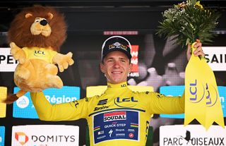 SAINTPERAY FRANCE JUNE 10 Remco Evenepoel of Belgium and Team Soudal QuickStep celebrates at podium as Yellow leader jersey winner during the 77th Criterium du Dauphine 2025 Stage 4 a 174km individual time trial stage from CharmessurRhone to SaintPeray UCIWT on June 10 2025 in SaintPeray France Photo by Dario BelingheriGetty Images
