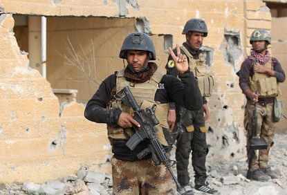 Iraqi troops claim victory over ISIS in Ramadi