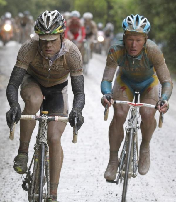 A stage for the ages - world champion Cadel Evans and Alexander Vinokourov on the muddy strade bianche during the 2010 Giro.