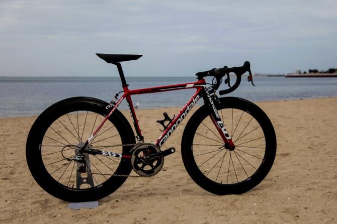 The team bike on display on the beach