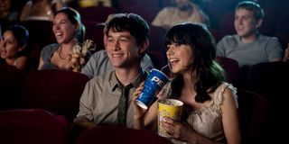 Joseph Gordon-Levitt and Zooey Deschanel enjoying a movie in 500 Days of Summer