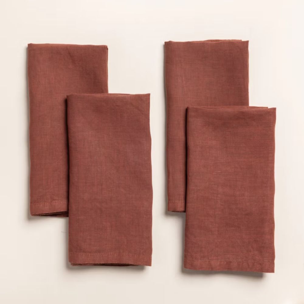 Set of four rust-colored linen napkins