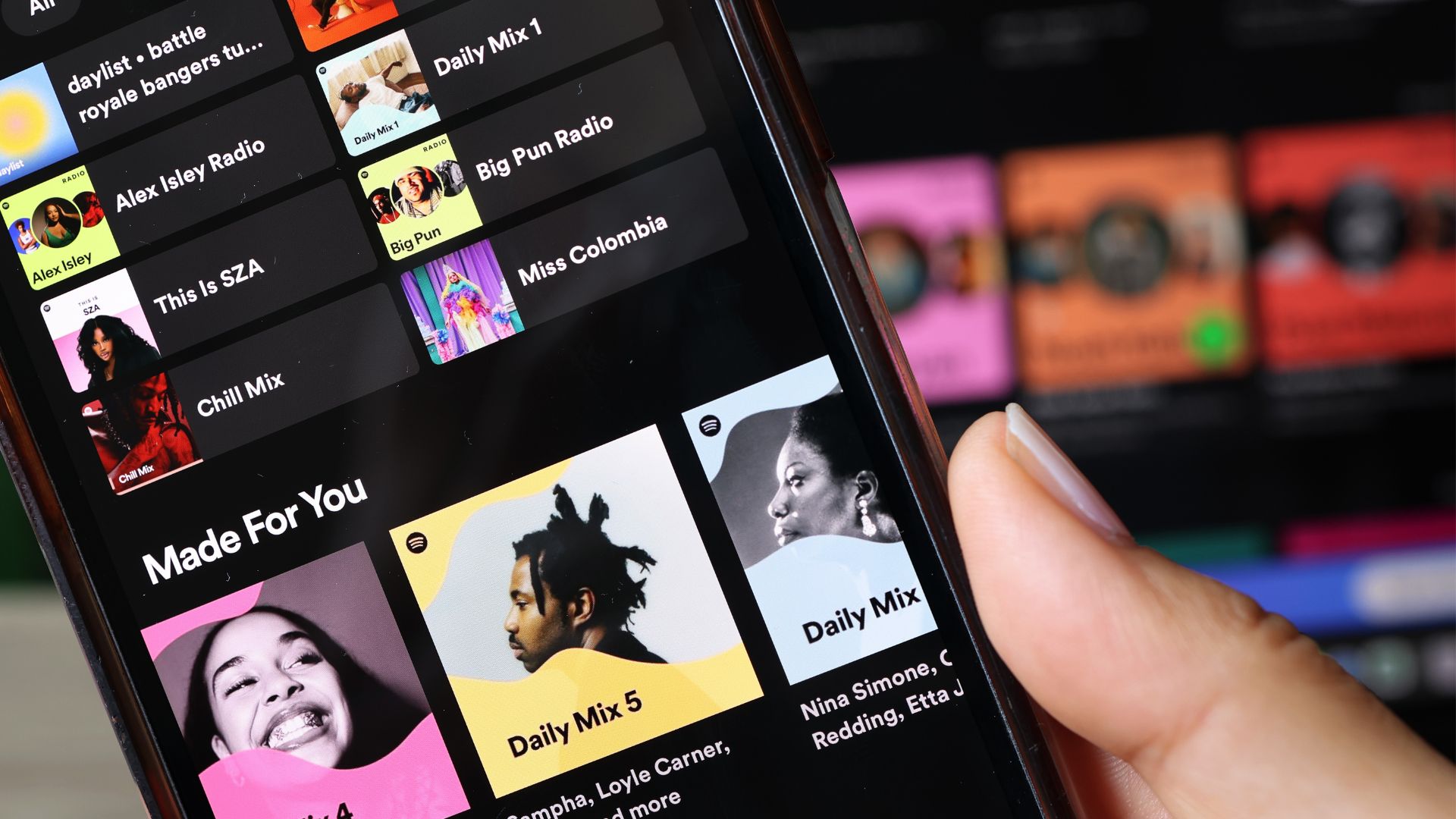 an image of the spotify homepage open on someone's phone