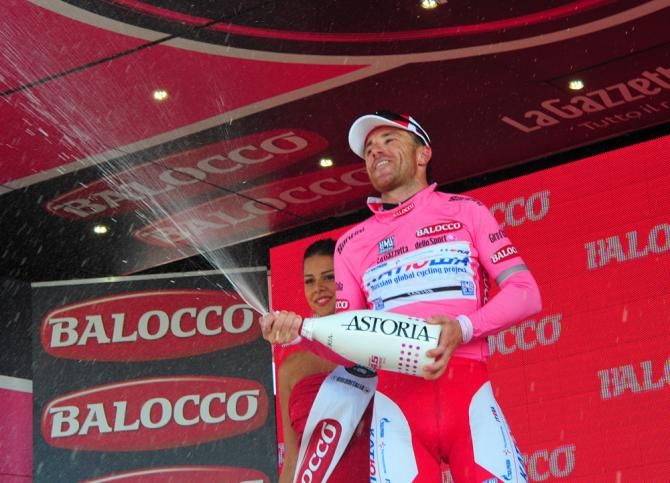 New Giro d'Italia leader Luca Paolini (Katusha) lets loose with the bubbly