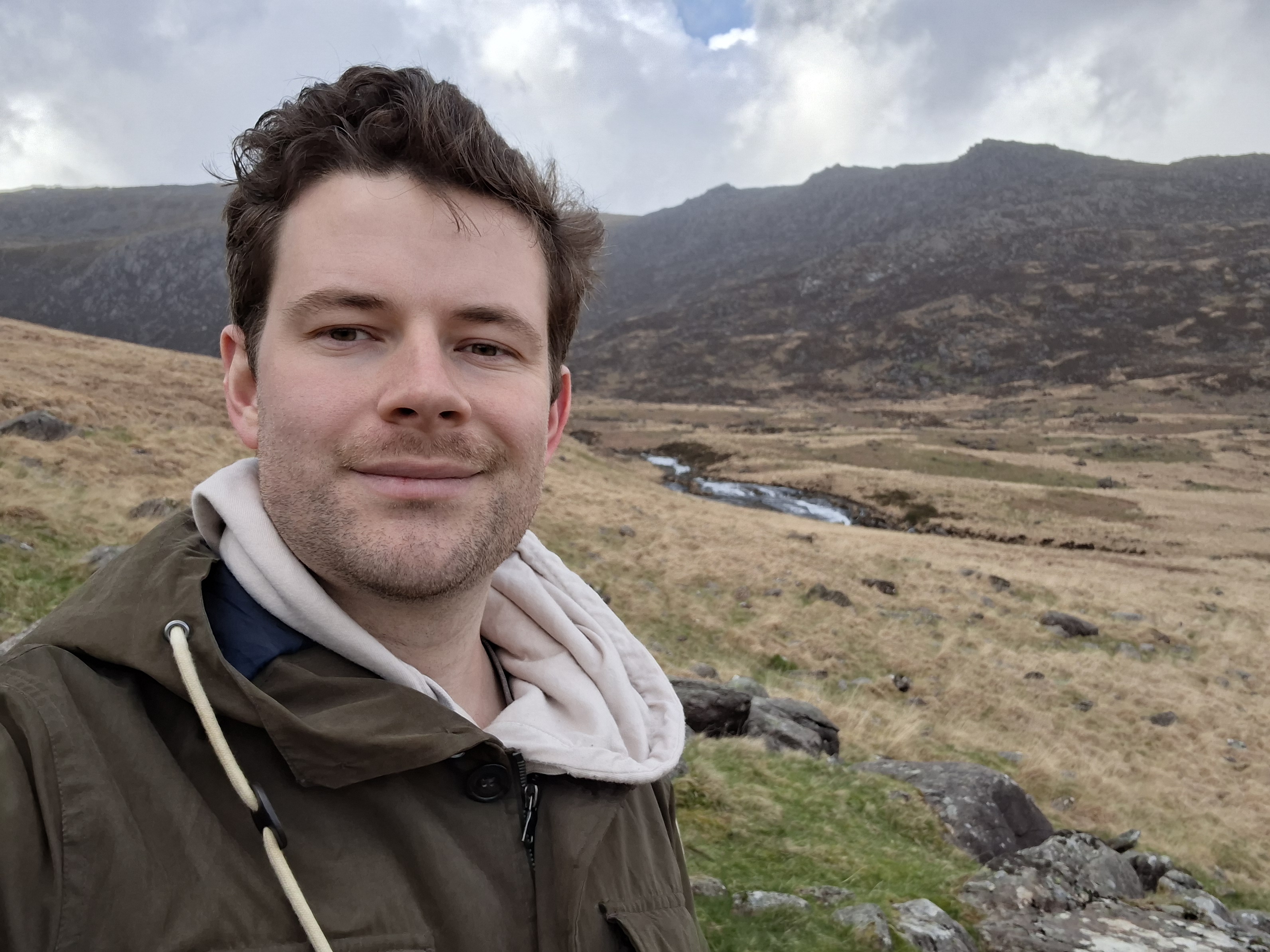 A photo taken on the Samsung Galaxy A57 showing a selfie in standard mode.