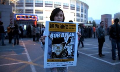A Bob Dylan fan on opening night of the artist's first-ever China concert: Despite a lifetime of activism, Dylan kept quiet about the communist country's recent crackdown.