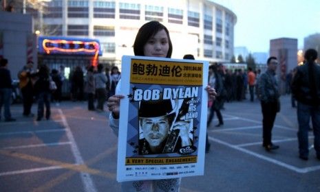 A Bob Dylan fan on opening night of the artist&amp;#039;s first-ever China concert: Despite a lifetime of activism, Dylan kept quiet about the communist country&amp;#039;s recent crackdown.