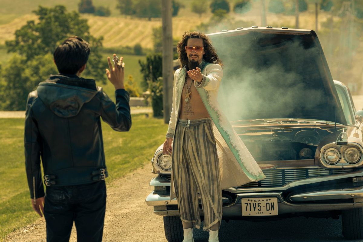 Justin H. Min as Ben Hargreeves and Robert Sheehan as Klaus Hargreeves in Season 2 of