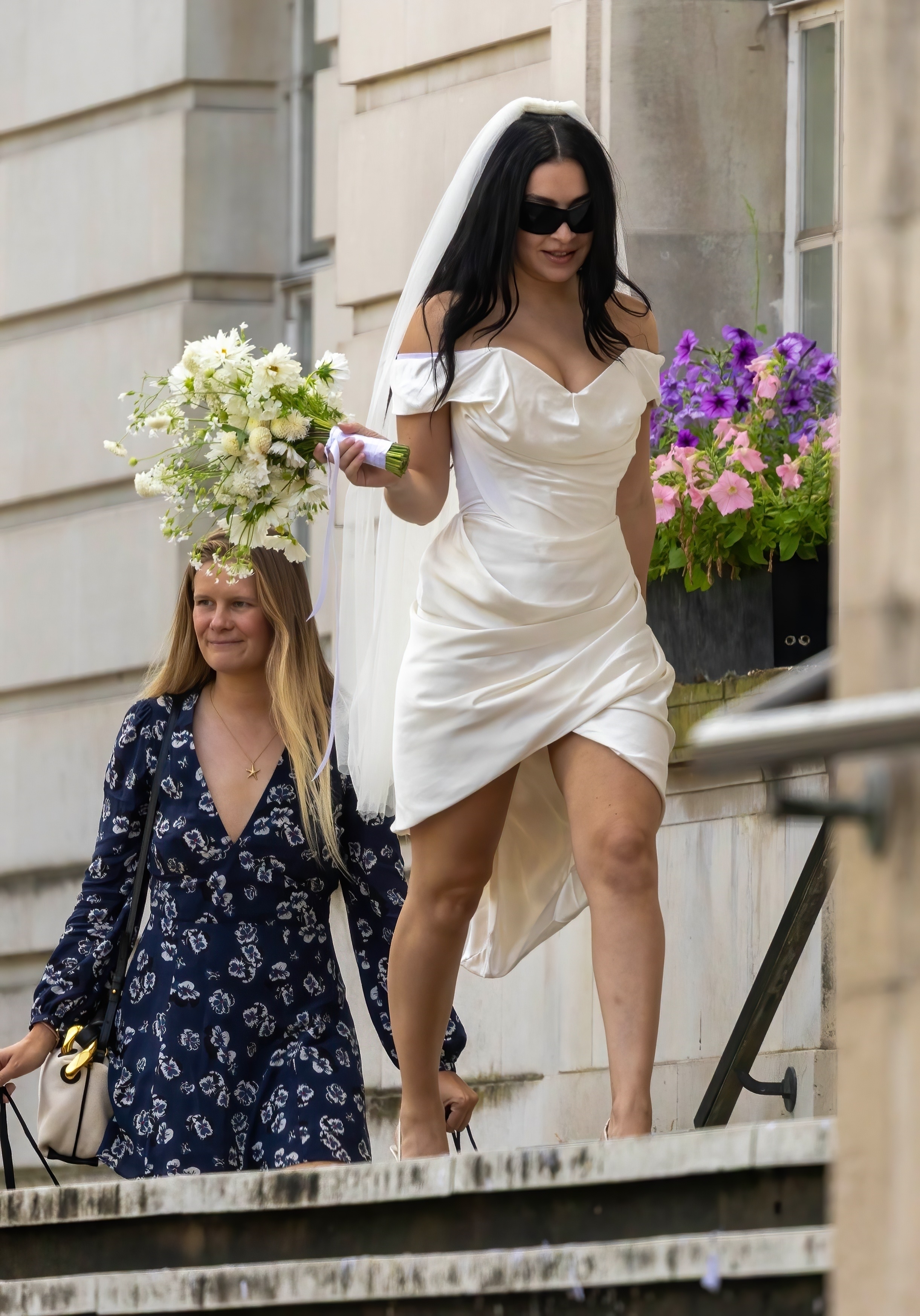 Charli XCX wearing a Vivienne Westwood minidress at her courthouse wedding.