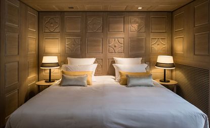 Bedroom with white bed and pillows