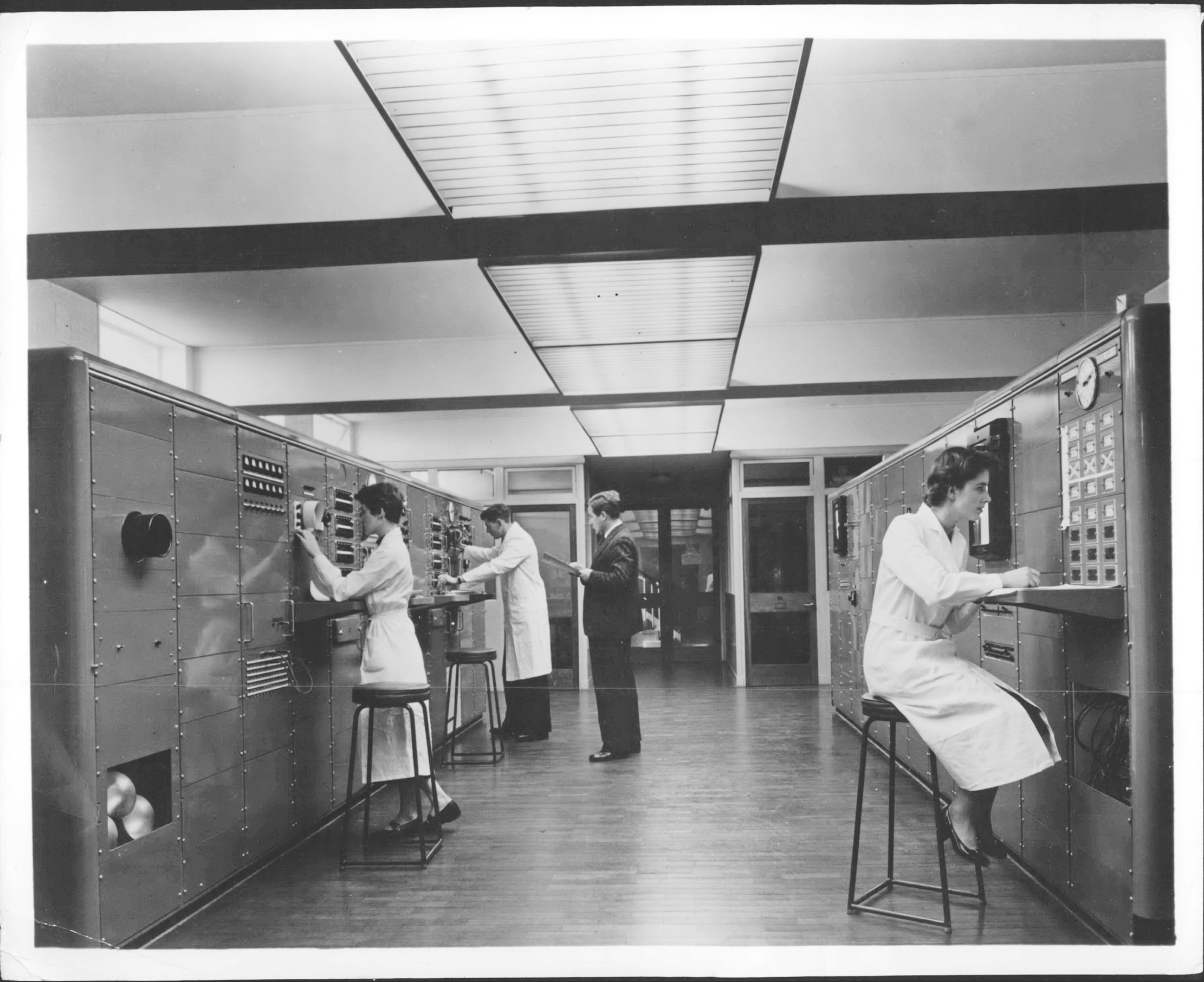 The nerve centre of Greenwich Mean Time, the Times Department Control Room at Herstmonceux, Sussex. The Royal Observatory moved to the location to avoid the dirty air of London.